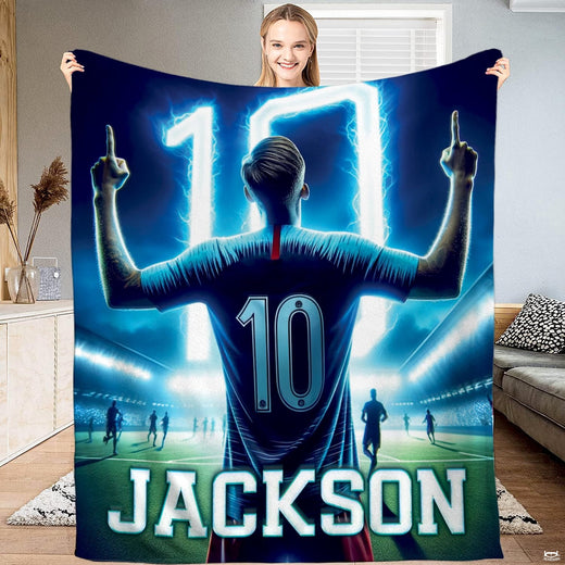 Football bedroom bedding displaying a victorious soccer player under glowing spotlights.