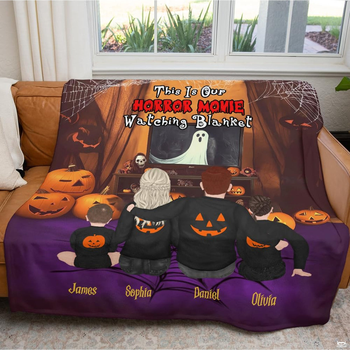 Overhead presentation of family horror movie night graphic blanket