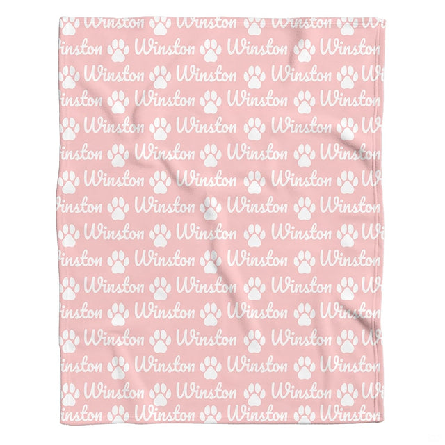 Paw print bedding set in pastel blush pink featuring delicate white canine tracks and cursive script.