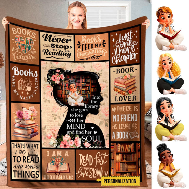 Person holding open the book lovers blanket displaying the central floral silhouette and book quote panels.