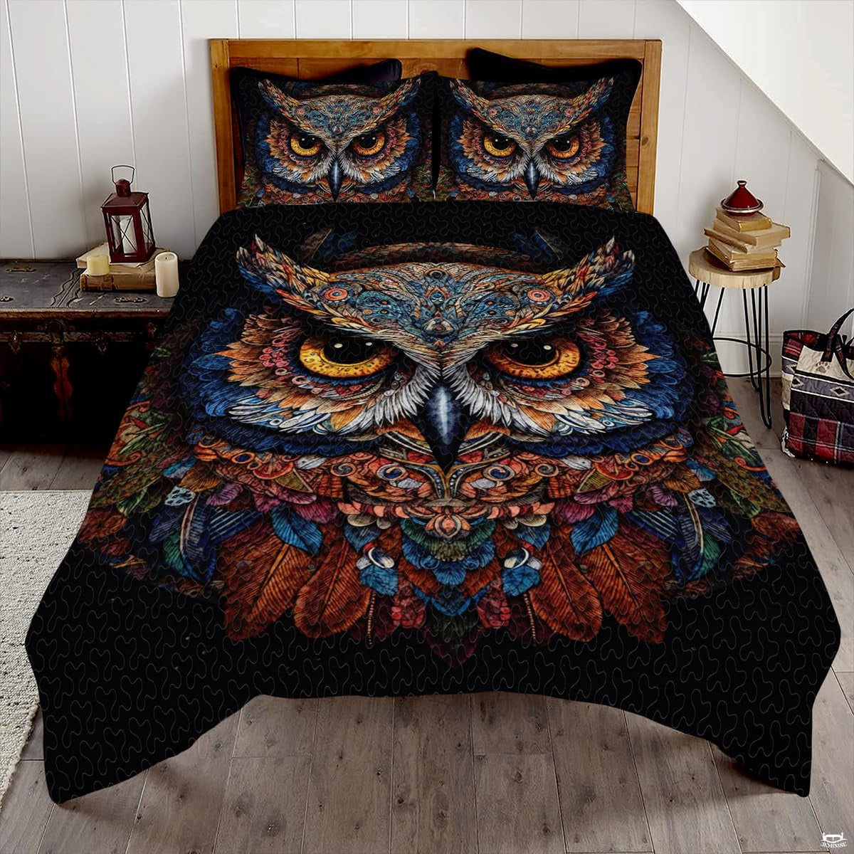 Moonlit silver and sapphire owl wildlife bedding set displayed neatly on a bed in a modern bedroom