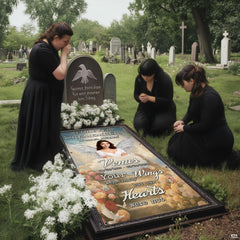 Overhead view of memorial angel grave blanket showing heavenly clouds and ascending stairway art.