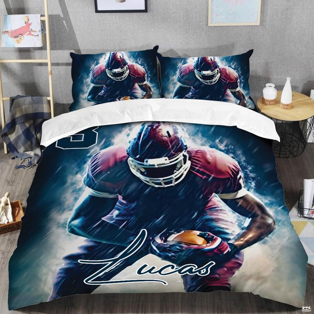 Close-up perspective of football bedding detailing helmet cage, maroon jersey highlights, and script typography