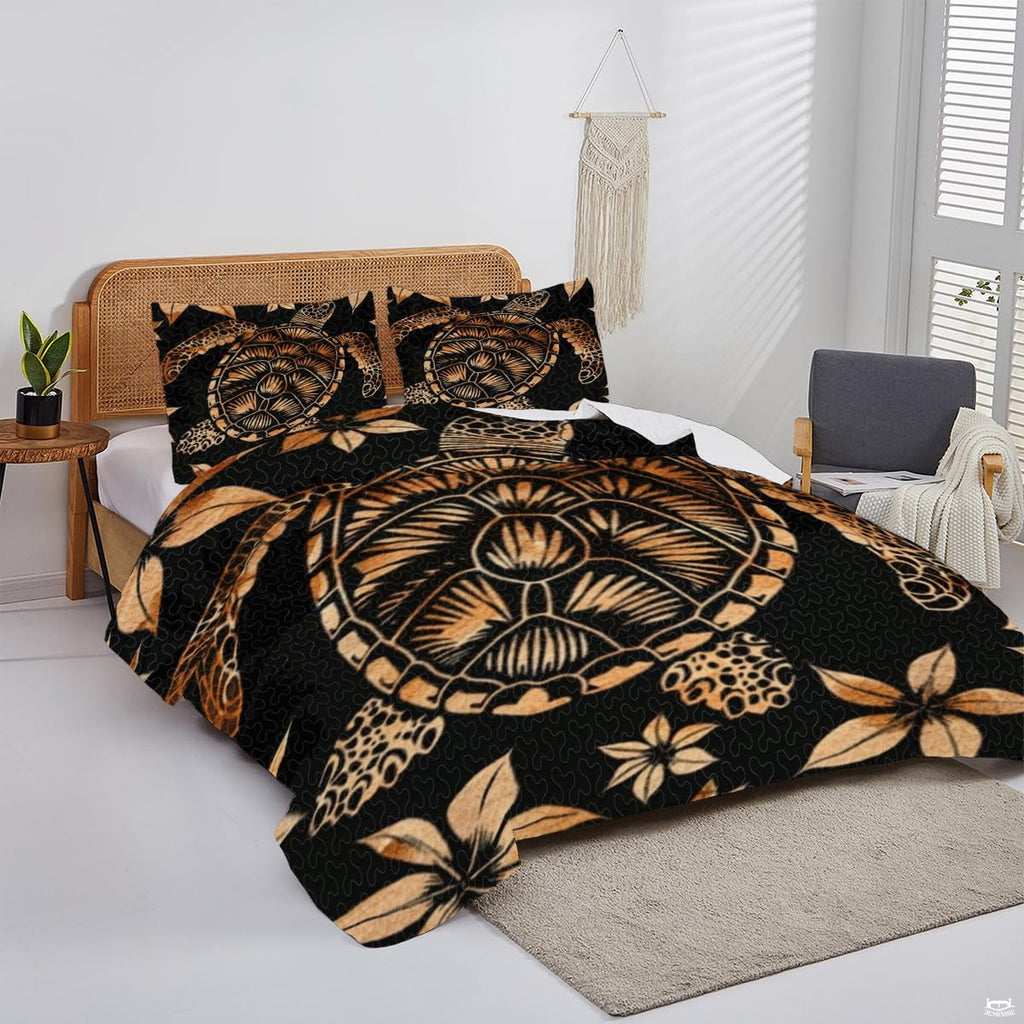 Side angle of sea turtle bedspread artwork displaying amber tones against an intense black backdrop.