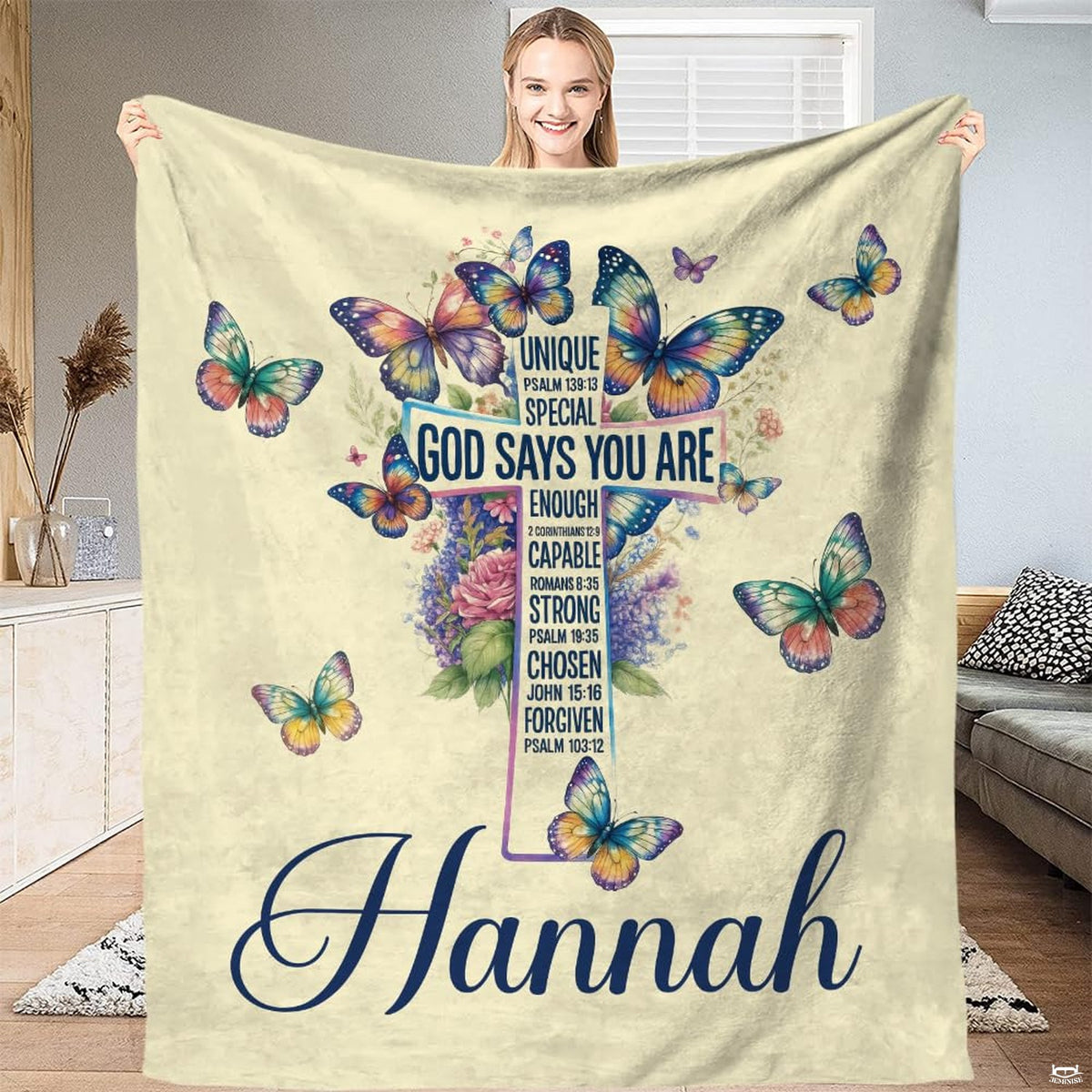 Artistic bedroom presentation of whimsical botanical cross and butterfly print.