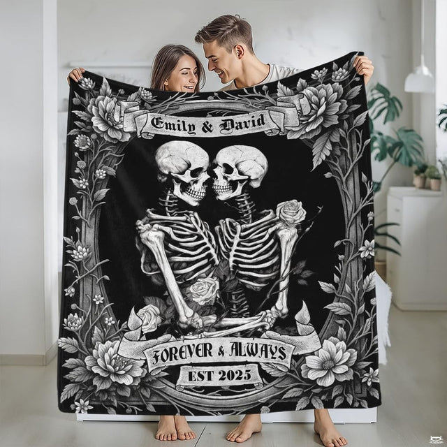 Detailed monochrome illustration of skeleton lovers framed by vintage roses and ribbon banners.
