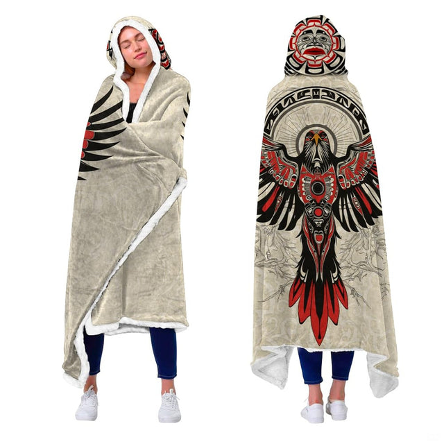 Front and back view of model wearing the Pacific Northwest eagle tribal art hooded blanket.