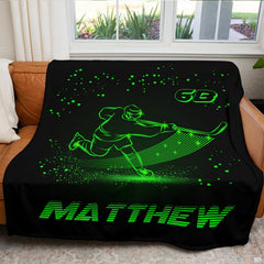 Vivid hockey player graphic artwork glowing in neon green across the center of the bed set.
