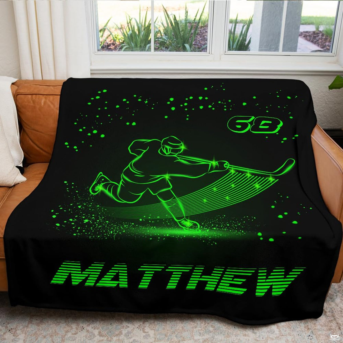 Vivid hockey player graphic artwork glowing in neon green across the center of the bed set.