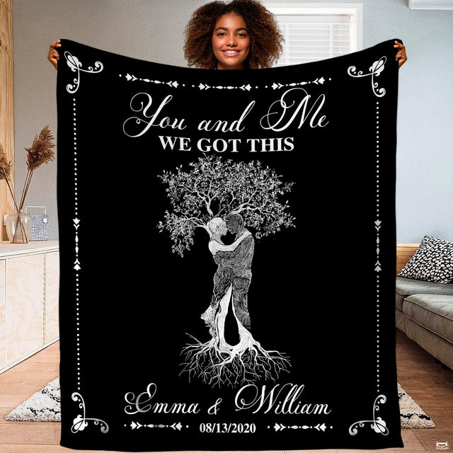 Monochrome romantic couple bedding set showing intertwined tree of life artwork and leafy foliage.