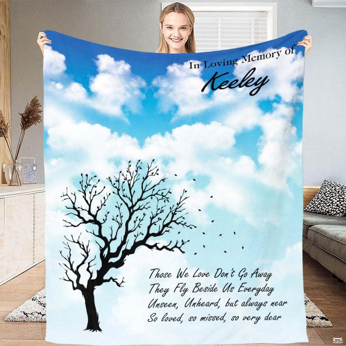 Serene bedding set graphic depicting bare tree silhouette and scattered windblown leaves on clear blue sky backdrop.