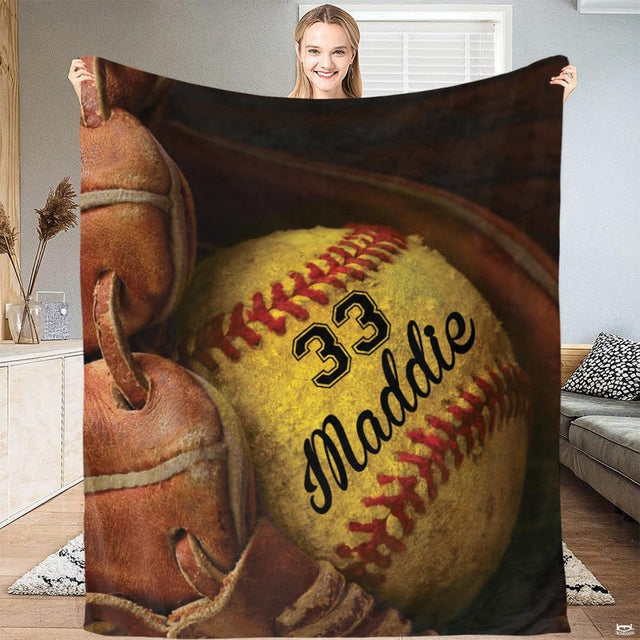 Close up macro view of softball glove throw blanket highlighting fabric texture and detailed glove print