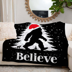 Christmas Bigfoot throw blanket view 6 highlighting Santa hat silhouette, falling snow, and festive tree