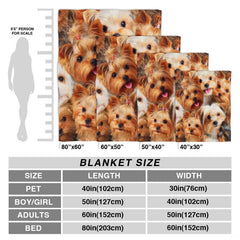 Detailed perspective of the varied golden, blonde, and tan fur textures of the Yorkie puppy group on the blanket