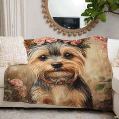 Folded presentation of the floral pet throw blanket resting neatly on an armchair.