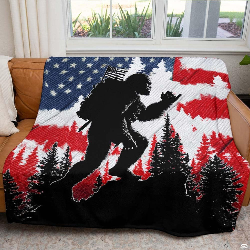 Patriotic Bigfoot throw blanket view 5 highlighting hiking Sasquatch silhouette and American flag pine trees