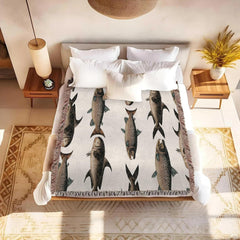 Close-up of heritage salmon and trout artwork rendered on vintage fish sheets for a rustic bedroom look.