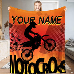 Motocross silhouette racing flag throw blanket held open by woman