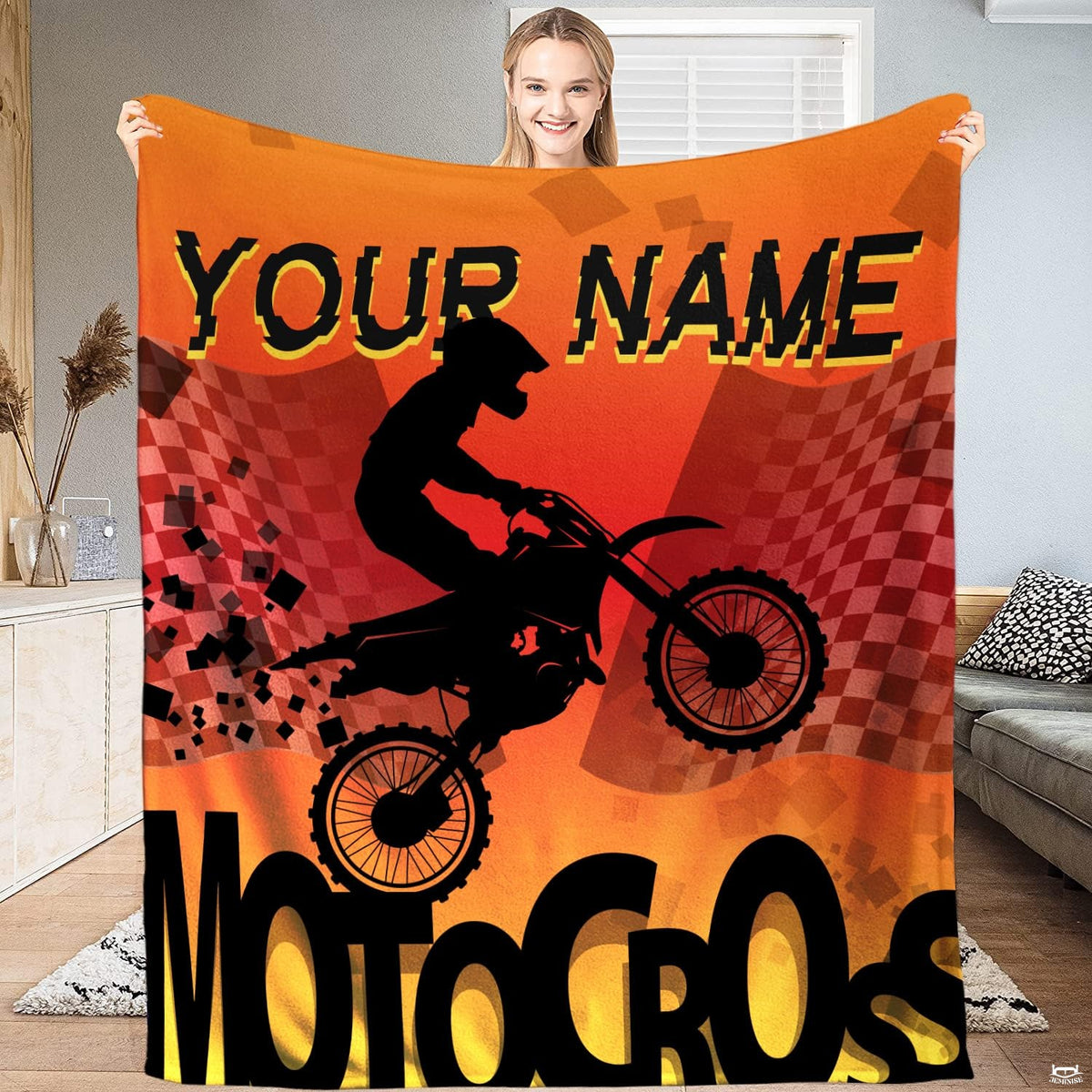 Motocross silhouette racing flag throw blanket held open by woman