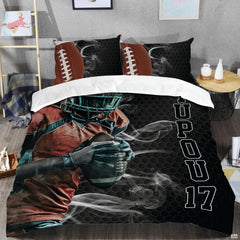Close-up perspective of sports bedding detailing textured football lacing and athletic collegiate typography