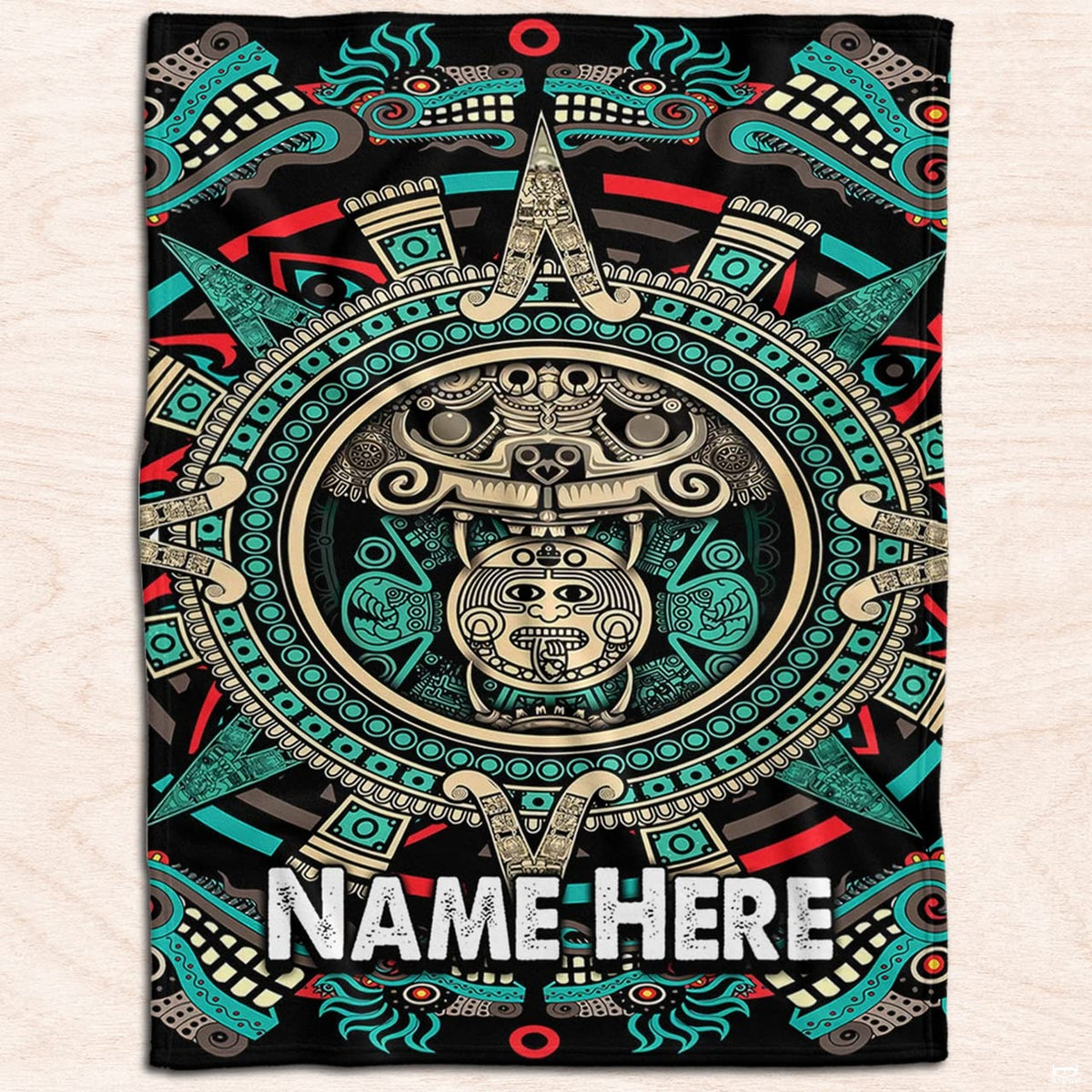Close-up of crimson red and turquoise pre-Columbian serpent dragon motifs in this maya bedding set design.