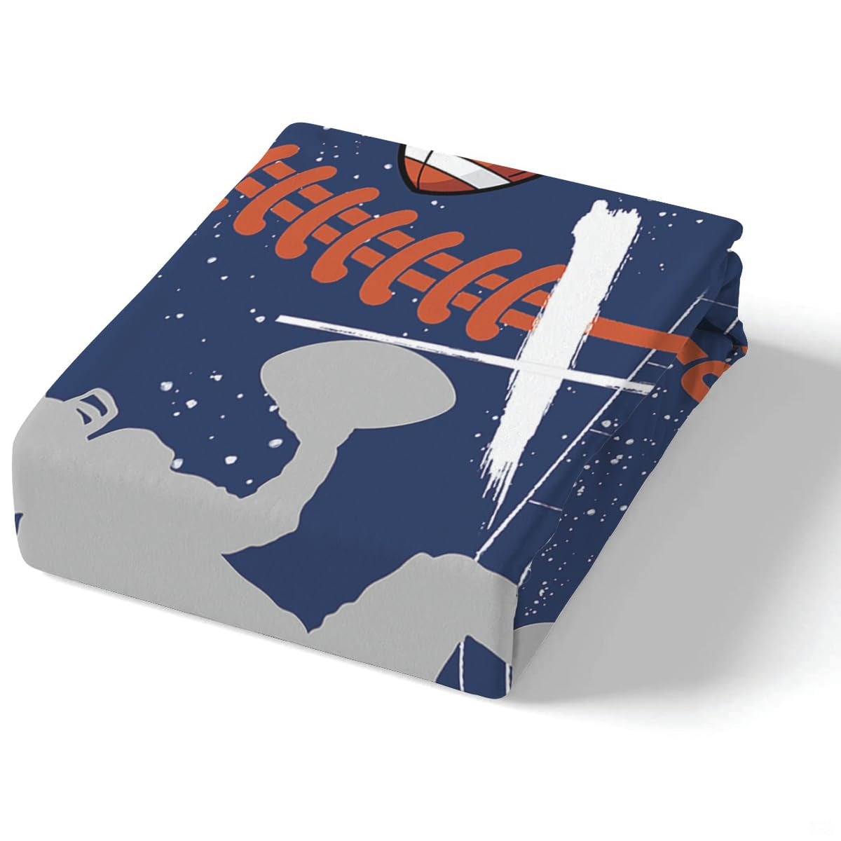 Corner angle of sports bedding highlighting crisp white cross printing and vibrant orange arc accents