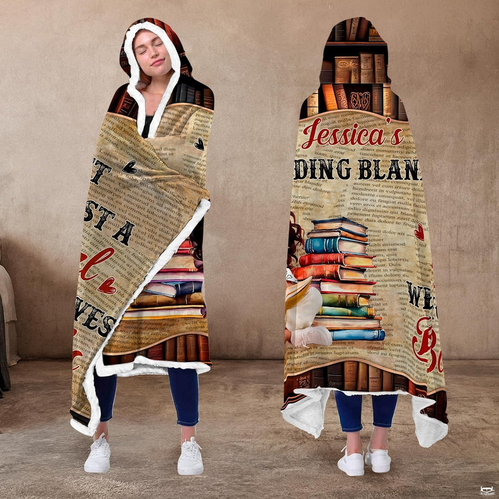 Library themed throw blanket displayed over a neutral armchair in a study room