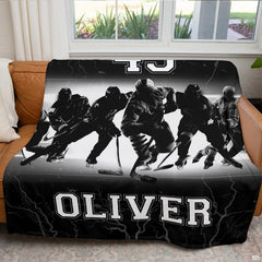 Close up shot showing fine graphic details and white underside of ice hockey team blanket.