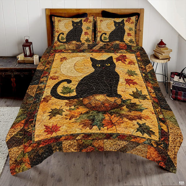Artistic bedding displaying a black cat with amber eyes under a crescent moon with autumn maple leaves.