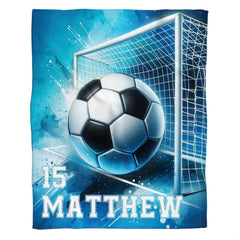 Flat perspective showing the soccer ball hitting the net with collegiate athletic lettering.