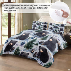 Close-up view of bear bedding highlighting detailed fur textures, pine trees, and woodland artwork