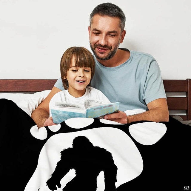 Sasquatch cryptid silhouette inside giant footprint forest motif accenting modern bedroom decor.