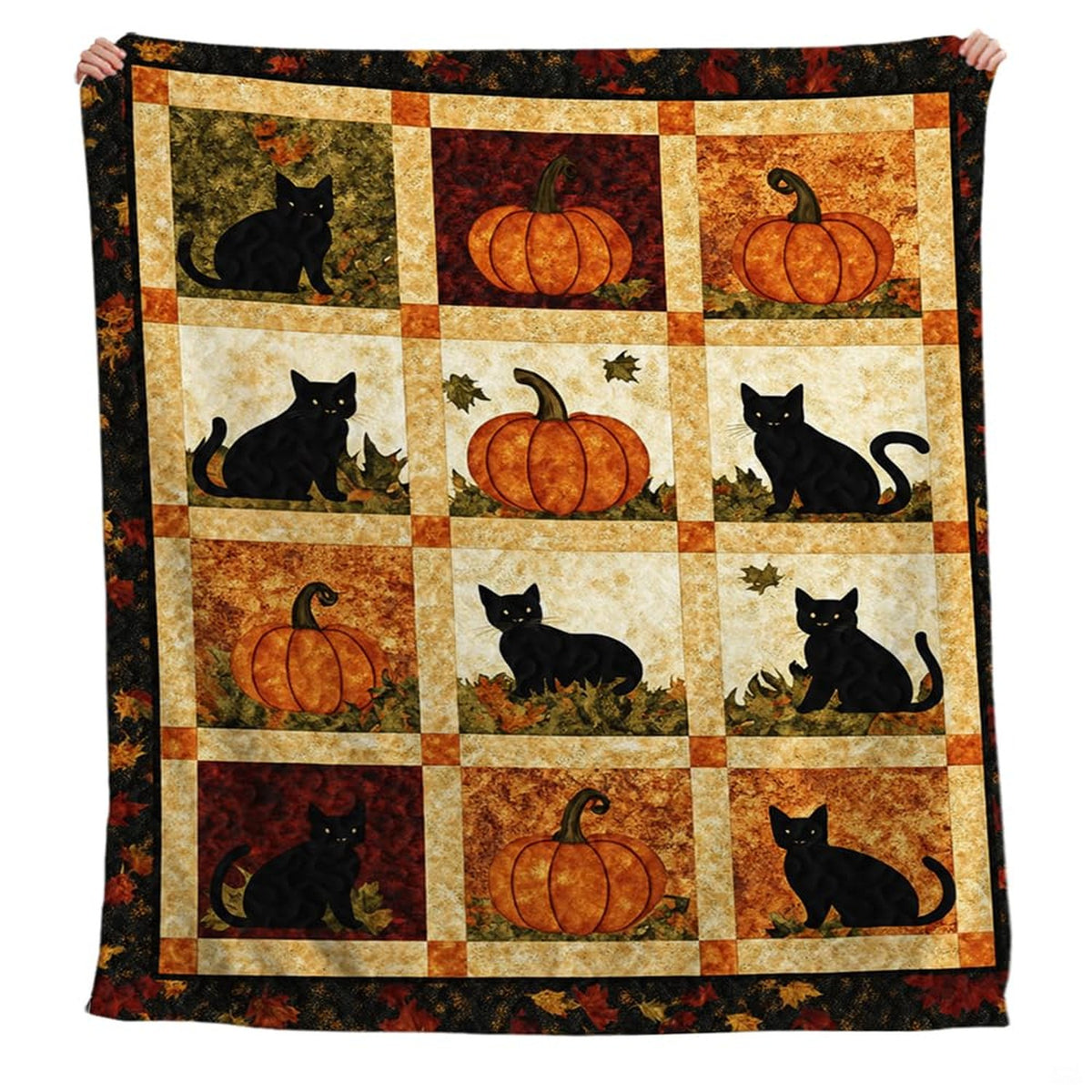 Top-down view of autumn leaf bedding set highlighting pumpkin orange leaf details and charcoal slate patchwork borders.