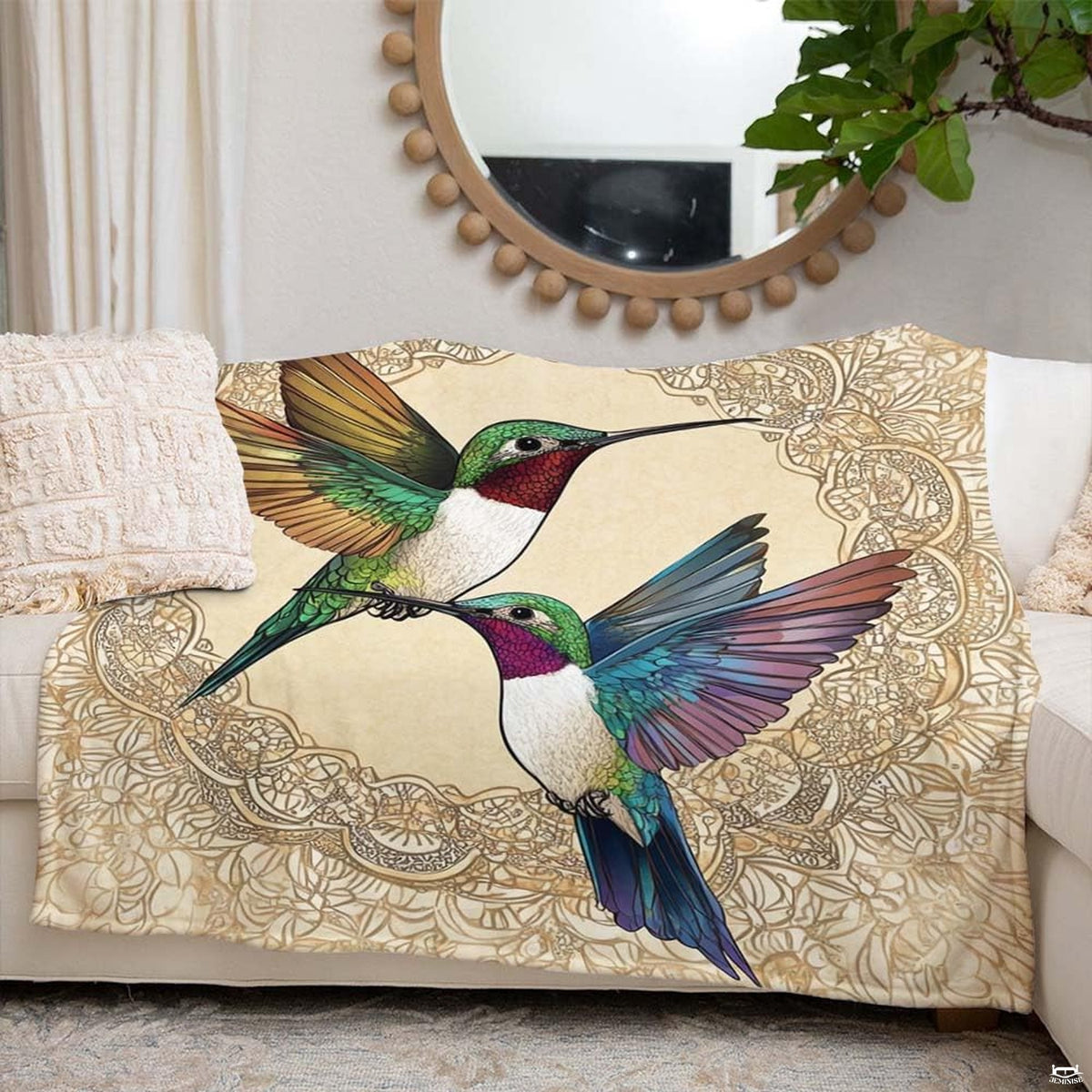 Full flat display of two hummingbirds on lace filigree parchment blanket.