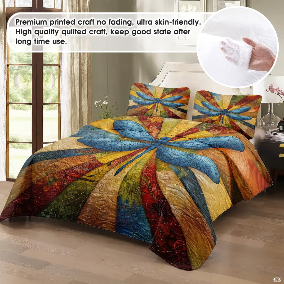 Close-up view of dragonfly bedding highlighting detailed insect wings, fall foliage, and patchwork blocks