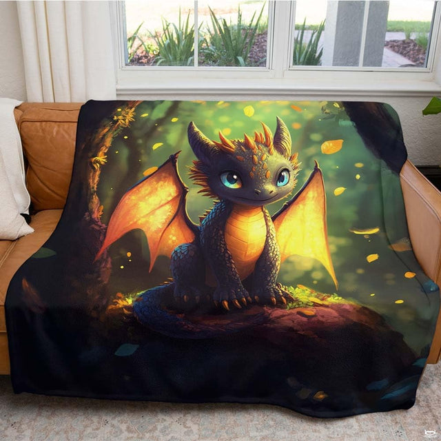 Baby dragon artwork featuring glowing amber wings and large blue eyes in woodland scene.