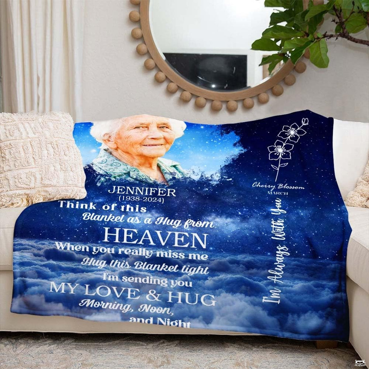 Serene memorial portrait design with celestial blue atmosphere and delicate floral graphics styled on living room furniture