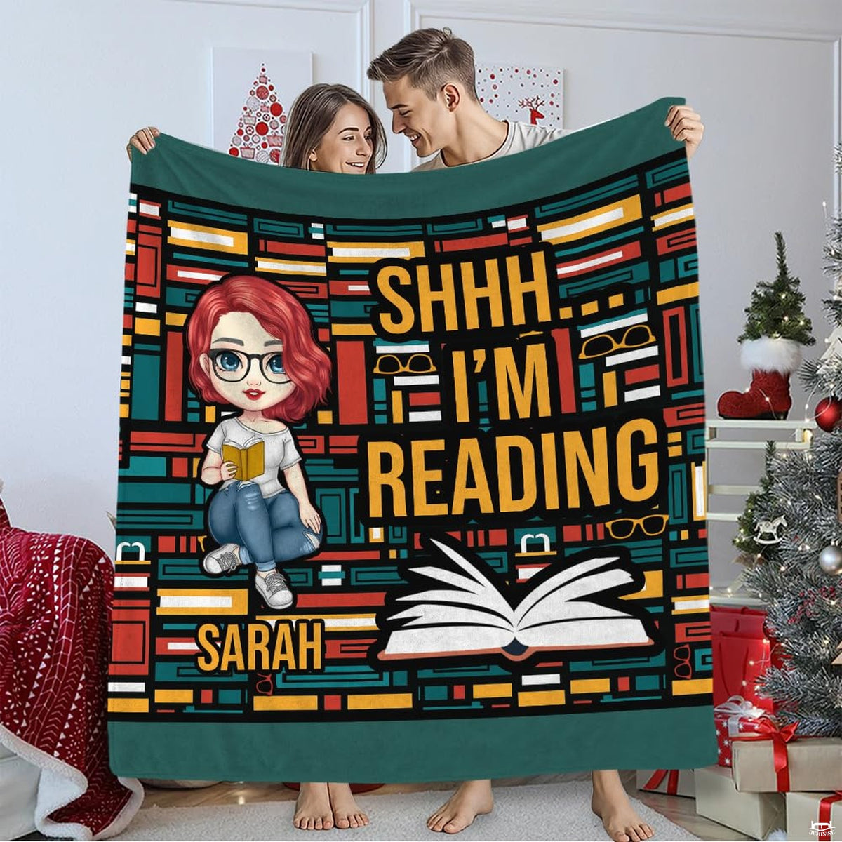 Living room staging displaying geometric bookshelf throw blanket draped over furniture.