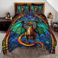 Orange dragon with teal wings in a colorful stained glass window displayed on a bed