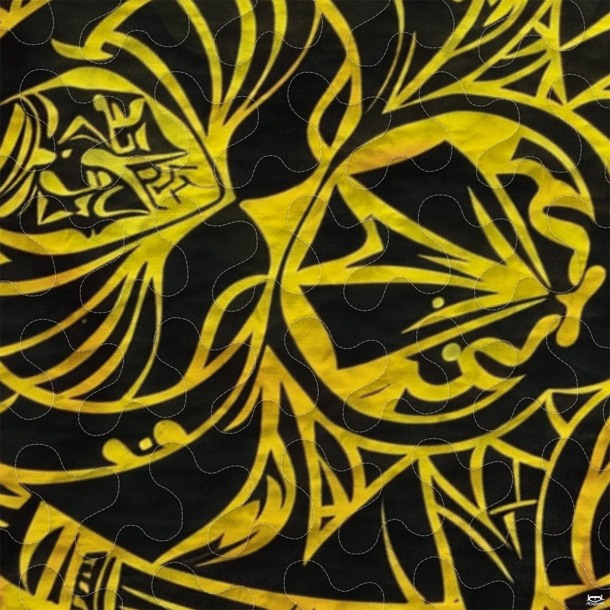 Close-up view of turtle bedding showcasing intricate Polynesian tribal motifs and golden yellow tones