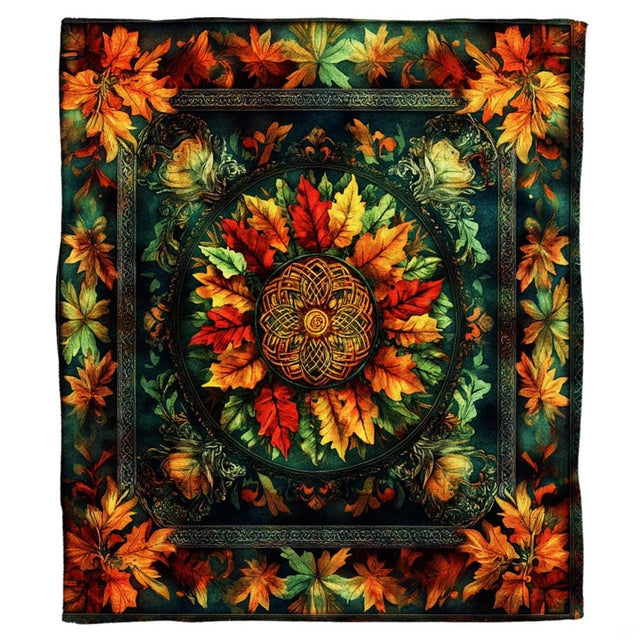 Celtic autumn leaf mandala throw blanket draped over sofa in cozy living room setting