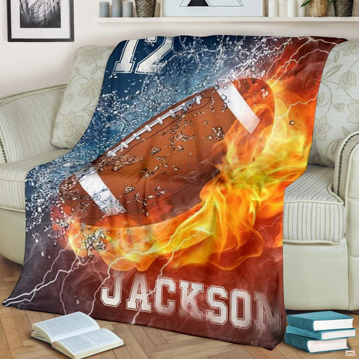 Gridiron fire and water clash football blanket draped over sofa