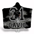 Football running back charging through swirling smoke with varsity number twenty-one, view 1.