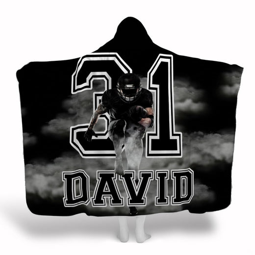 Football running back charging through swirling smoke with varsity number twenty-one, view 1.