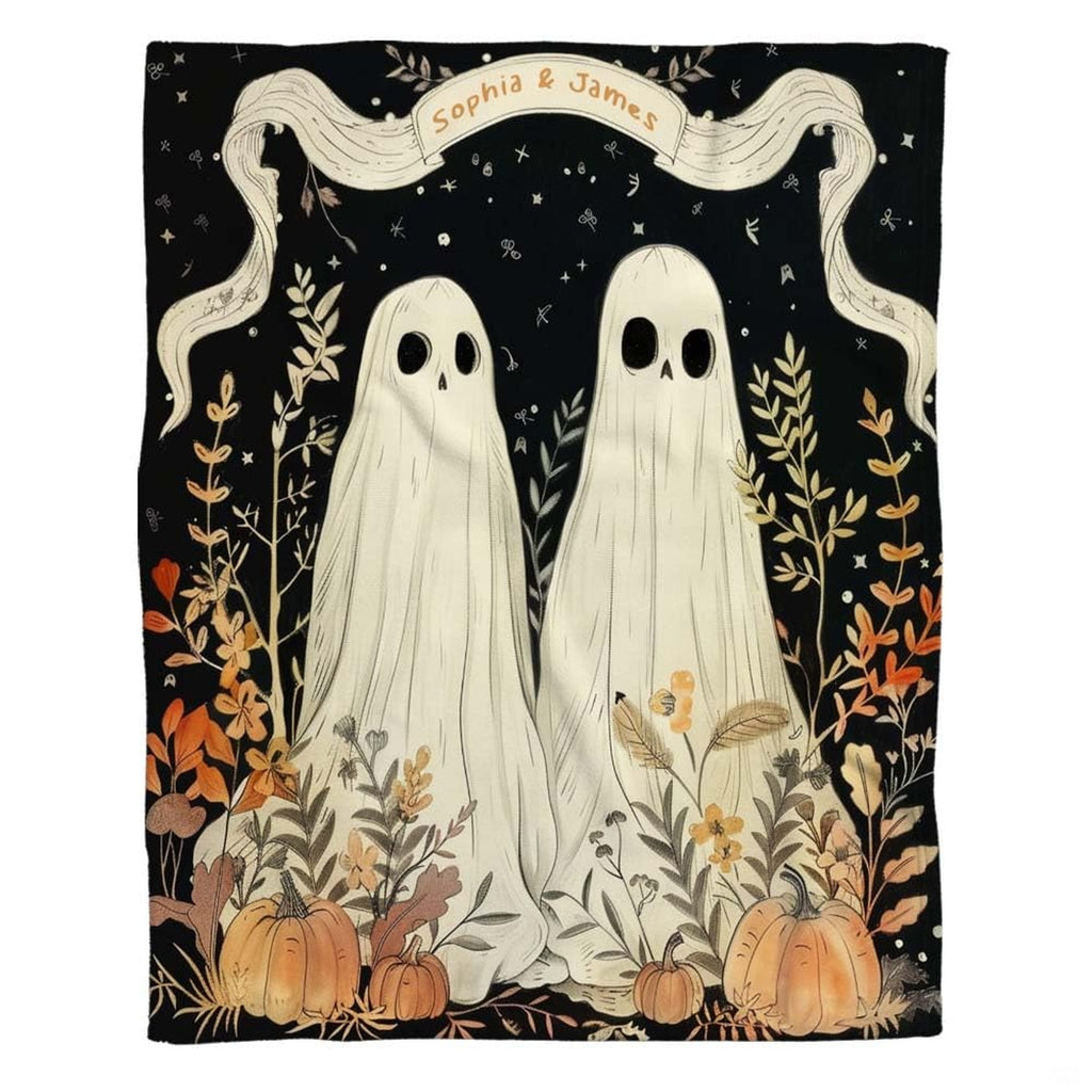 Close view of gothic botanical wildflowers, pumpkins, and draped ghost illustration on bed sheets.