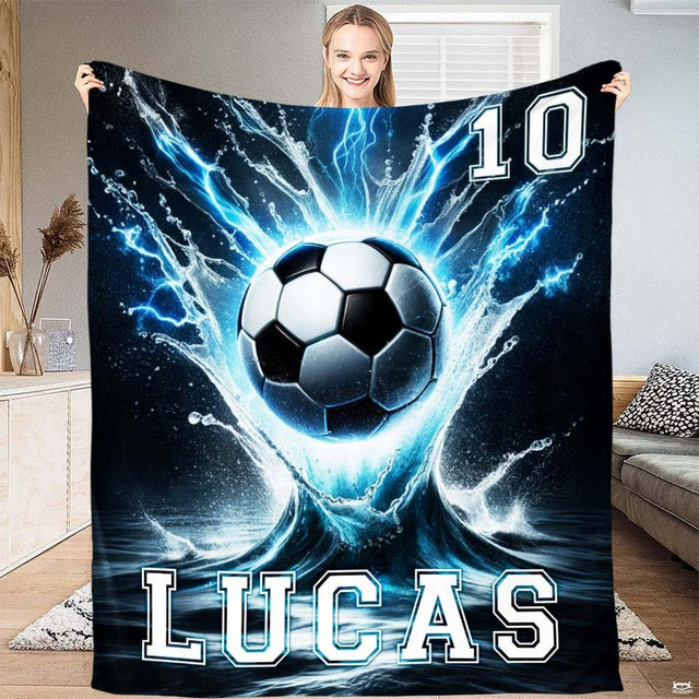 Electric water splash soccer ball art blanket held up by woman