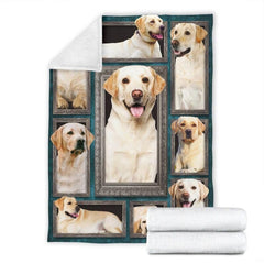 Folded corner and rolled layout of the Yellow Labrador Retriever blanket showing the white reverse side.