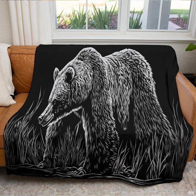 High-contrast monochrome woodcut engraving of grizzly bear walking through tall grass on black background, view 2.