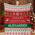 Festive ugly sweater holiday Fair Isle blanket held before Christmas tree
