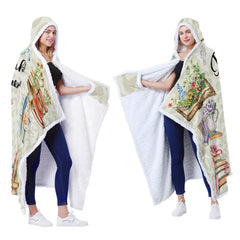 Full display of chibi reader girl floral book stack blanket presented on model.